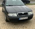 Черный Шкода Октавия, объемом двигателя 1.6 л и пробегом 315 тыс. км за 4200 $, фото 1 на Automoto.ua