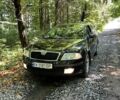 Черный Шкода Октавия, объемом двигателя 1.6 л и пробегом 274 тыс. км за 5700 $, фото 1 на Automoto.ua