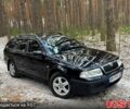 Черный Шкода Октавия, объемом двигателя 1.6 л и пробегом 200 тыс. км за 6400 $, фото 1 на Automoto.ua
