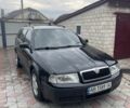 Черный Шкода Октавия, объемом двигателя 1.6 л и пробегом 276 тыс. км за 4300 $, фото 1 на Automoto.ua