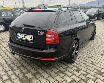 Черный Шкода Октавия, объемом двигателя 2 л и пробегом 180 тыс. км за 7777 $, фото 4 на Automoto.ua