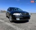Черный Шкода Октавия, объемом двигателя 1.6 л и пробегом 240 тыс. км за 4000 $, фото 1 на Automoto.ua