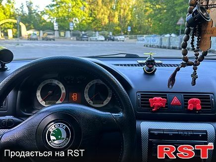 Черный Шкода Октавия, объемом двигателя 1.8 л и пробегом 322 тыс. км за 7500 $, фото 6 на Automoto.ua