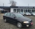 Черный Шкода Октавия, объемом двигателя 1.6 л и пробегом 165 тыс. км за 6750 $, фото 1 на Automoto.ua
