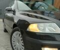 Черный Шкода Октавия, объемом двигателя 1.6 л и пробегом 350 тыс. км за 4800 $, фото 5 на Automoto.ua