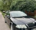 Черный Шкода Октавия, объемом двигателя 1.6 л и пробегом 170 тыс. км за 7500 $, фото 1 на Automoto.ua