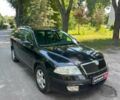 Черный Шкода Октавия, объемом двигателя 2 л и пробегом 241 тыс. км за 6290 $, фото 2 на Automoto.ua