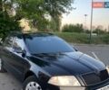 Черный Шкода Октавия, объемом двигателя 1.6 л и пробегом 242 тыс. км за 5200 $, фото 1 на Automoto.ua