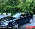 Черный Шкода Октавия, объемом двигателя 1.8 л и пробегом 322 тыс. км за 7500 $, фото 1 на Automoto.ua