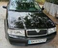 Черный Шкода Октавия, объемом двигателя 1.6 л и пробегом 178 тыс. км за 4500 $, фото 1 на Automoto.ua