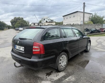 Черный Шкода Октавия, объемом двигателя 1.6 л и пробегом 210 тыс. км за 4550 $, фото 2 на Automoto.ua