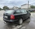 Черный Шкода Октавия, объемом двигателя 1.6 л и пробегом 210 тыс. км за 4550 $, фото 2 на Automoto.ua