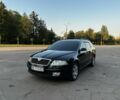 Черный Шкода Октавия, объемом двигателя 2 л и пробегом 229 тыс. км за 5765 $, фото 1 на Automoto.ua