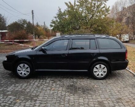 Чорний Шкода Октавія, об'ємом двигуна 1.8 л та пробігом 260 тис. км за 5588 $, фото 2 на Automoto.ua
