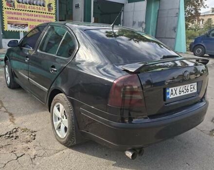 Черный Шкода Октавия, объемом двигателя 1.6 л и пробегом 155 тыс. км за 5300 $, фото 1 на Automoto.ua