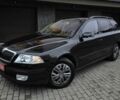 Черный Шкода Октавия, объемом двигателя 1.6 л и пробегом 256 тыс. км за 6300 $, фото 1 на Automoto.ua