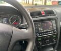 Черный Шкода Октавия, объемом двигателя 1.6 л и пробегом 202 тыс. км за 6100 $, фото 1 на Automoto.ua