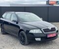 Черный Шкода Октавия, объемом двигателя 1.6 л и пробегом 256 тыс. км за 5950 $, фото 1 на Automoto.ua