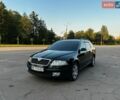 Черный Шкода Октавия, объемом двигателя 1.98 л и пробегом 229 тыс. км за 5750 $, фото 1 на Automoto.ua