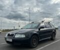 Черный Шкода Октавия, объемом двигателя 1.6 л и пробегом 238 тыс. км за 3200 $, фото 1 на Automoto.ua