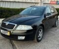 Черный Шкода Октавия, объемом двигателя 1.6 л и пробегом 230 тыс. км за 7100 $, фото 1 на Automoto.ua