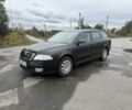Черный Шкода Октавия, объемом двигателя 1.6 л и пробегом 210 тыс. км за 4550 $, фото 1 на Automoto.ua