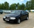 Черный Шкода Октавия, объемом двигателя 1.6 л и пробегом 255 тыс. км за 5200 $, фото 1 на Automoto.ua