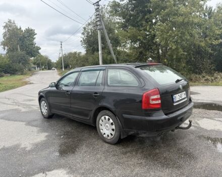 Черный Шкода Октавия, объемом двигателя 1.6 л и пробегом 210 тыс. км за 4550 $, фото 3 на Automoto.ua