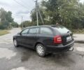 Черный Шкода Октавия, объемом двигателя 1.6 л и пробегом 210 тыс. км за 4550 $, фото 3 на Automoto.ua