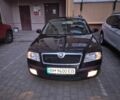 Черный Шкода Октавия, объемом двигателя 1.6 л и пробегом 256 тыс. км за 6000 $, фото 1 на Automoto.ua