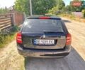 Черный Шкода Октавия, объемом двигателя 1.6 л и пробегом 260 тыс. км за 5400 $, фото 1 на Automoto.ua