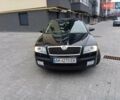 Черный Шкода Октавия, объемом двигателя 1.6 л и пробегом 260 тыс. км за 6400 $, фото 1 на Automoto.ua