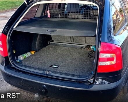 Черный Шкода Октавия, объемом двигателя 1.6 л и пробегом 290 тыс. км за 6500 $, фото 4 на Automoto.ua