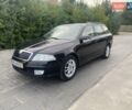 Черный Шкода Октавия, объемом двигателя 1.6 л и пробегом 209 тыс. км за 5700 $, фото 1 на Automoto.ua