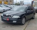 Черный Шкода Октавия, объемом двигателя 2 л и пробегом 351 тыс. км за 6590 $, фото 1 на Automoto.ua