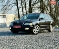 Черный Шкода Октавия, объемом двигателя 1.6 л и пробегом 212 тыс. км за 5450 $, фото 1 на Automoto.ua