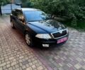 Черный Шкода Октавия, объемом двигателя 1.6 л и пробегом 204 тыс. км за 6869 $, фото 1 на Automoto.ua