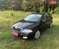 Черный Шкода Октавия, объемом двигателя 1.6 л и пробегом 206 тыс. км за 7300 $, фото 1 на Automoto.ua