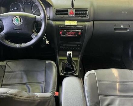 Черный Шкода Октавия, объемом двигателя 1.8 л и пробегом 343 тыс. км за 5550 $, фото 1 на Automoto.ua