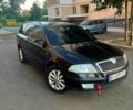 Черный Шкода Октавия, объемом двигателя 2 л и пробегом 248 тыс. км за 8000 $, фото 3 на Automoto.ua