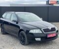 Черный Шкода Октавия, объемом двигателя 1.6 л и пробегом 256 тыс. км за 5650 $, фото 1 на Automoto.ua