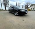 Черный Шкода Октавия, объемом двигателя 1.8 л и пробегом 303 тыс. км за 5000 $, фото 1 на Automoto.ua