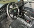 Черный Шкода Октавия, объемом двигателя 1.8 л и пробегом 352 тыс. км за 4830 $, фото 1 на Automoto.ua
