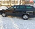 Черный Шкода Октавия, объемом двигателя 1.6 л и пробегом 220 тыс. км за 5850 $, фото 1 на Automoto.ua