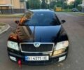 Черный Шкода Октавия, объемом двигателя 2 л и пробегом 248 тыс. км за 8000 $, фото 1 на Automoto.ua