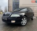 Чорний Шкода Октавія, об'ємом двигуна 1.6 л та пробігом 209 тис. км за 7600 $, фото 1 на Automoto.ua