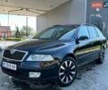 Черный Шкода Октавия, объемом двигателя 1.6 л и пробегом 203 тыс. км за 5999 $, фото 1 на Automoto.ua