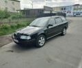 Черный Шкода Октавия, объемом двигателя 1.6 л и пробегом 228 тыс. км за 5300 $, фото 1 на Automoto.ua