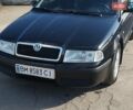 Черный Шкода Октавия, объемом двигателя 1.6 л и пробегом 256 тыс. км за 5500 $, фото 1 на Automoto.ua