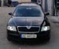 Черный Шкода Октавия, объемом двигателя 1.6 л и пробегом 260 тыс. км за 7400 $, фото 1 на Automoto.ua